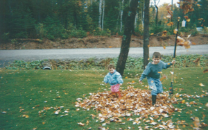 Elyse and her brother, Jordan, enjoying the fall leaves